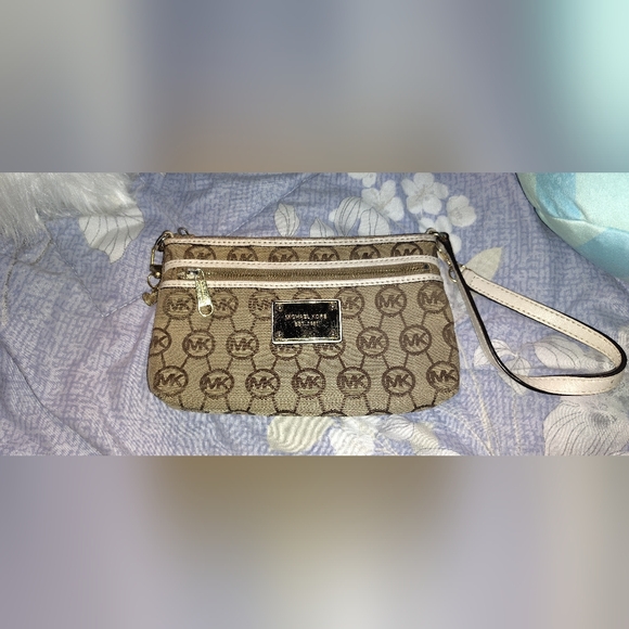 Michael Kors Handbags - Michael Kors Tan Monogram Wristlet